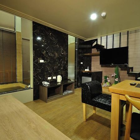 58˚ Hotspring Hotel Джиаоси Стая снимка