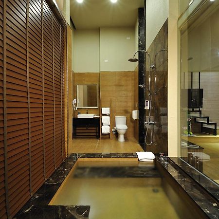 58˚ Hotspring Hotel Джиаоси Стая снимка