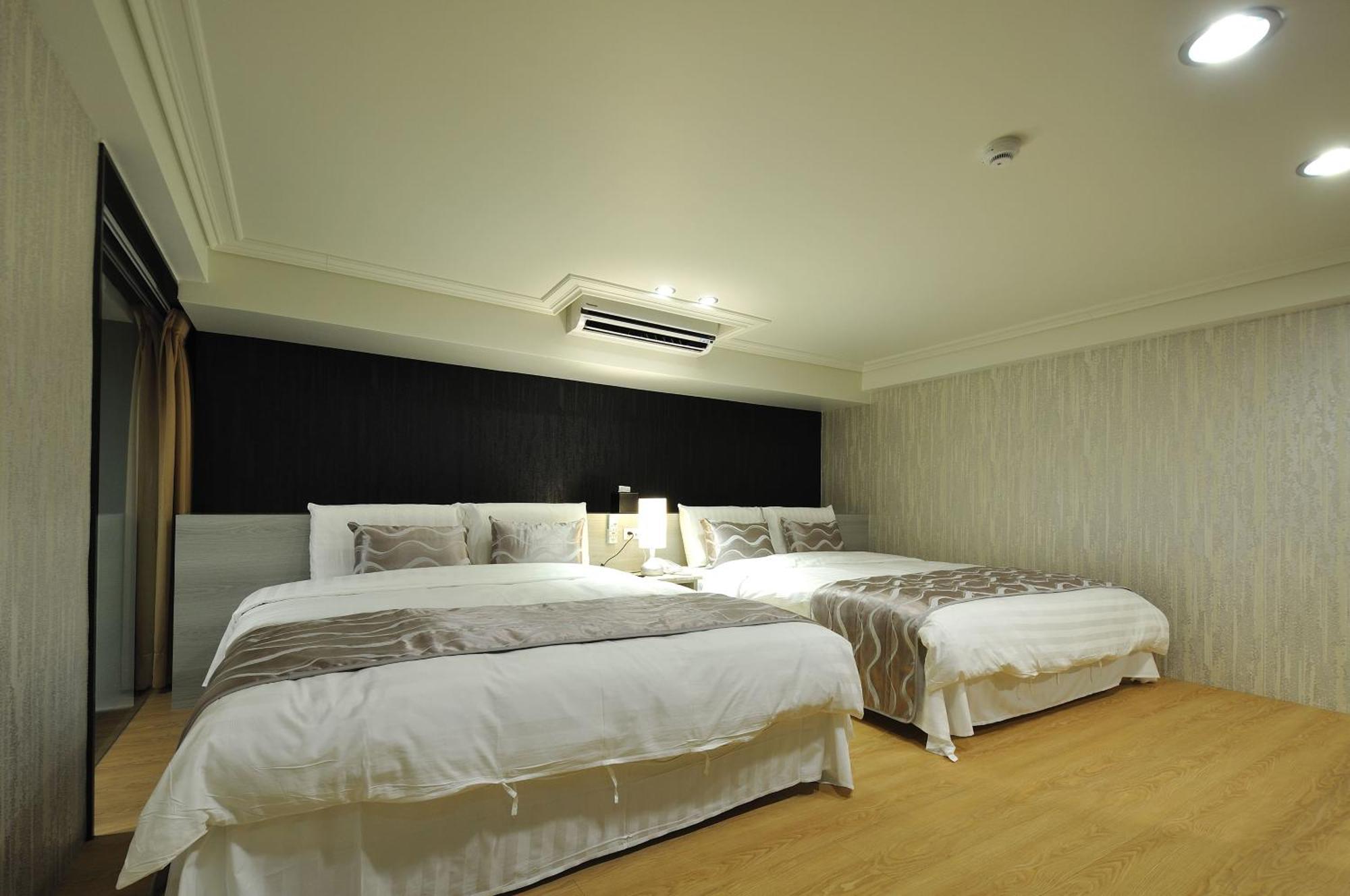58˚ Hotspring Hotel Джиаоси Стая снимка