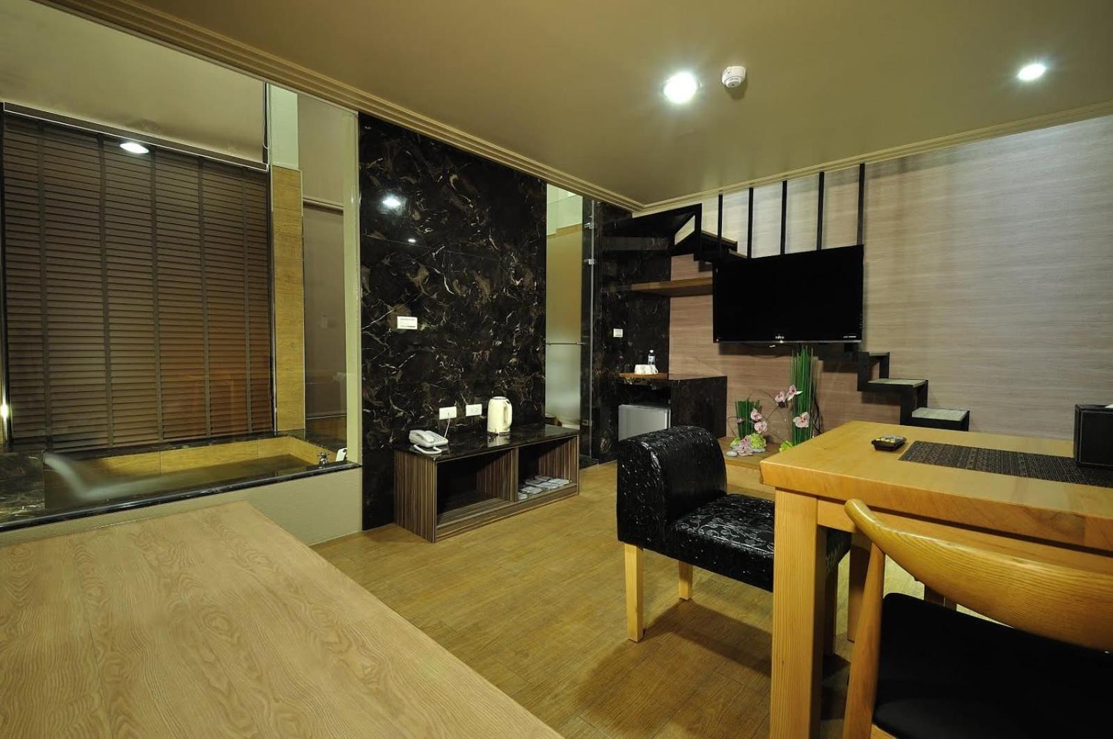 58˚ Hotspring Hotel Джиаоси Стая снимка
