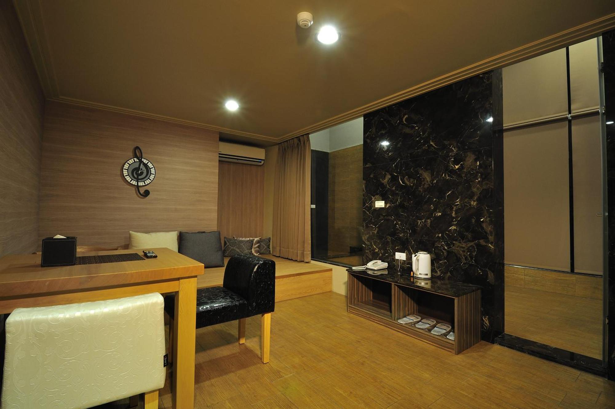 58˚ Hotspring Hotel Джиаоси Стая снимка
