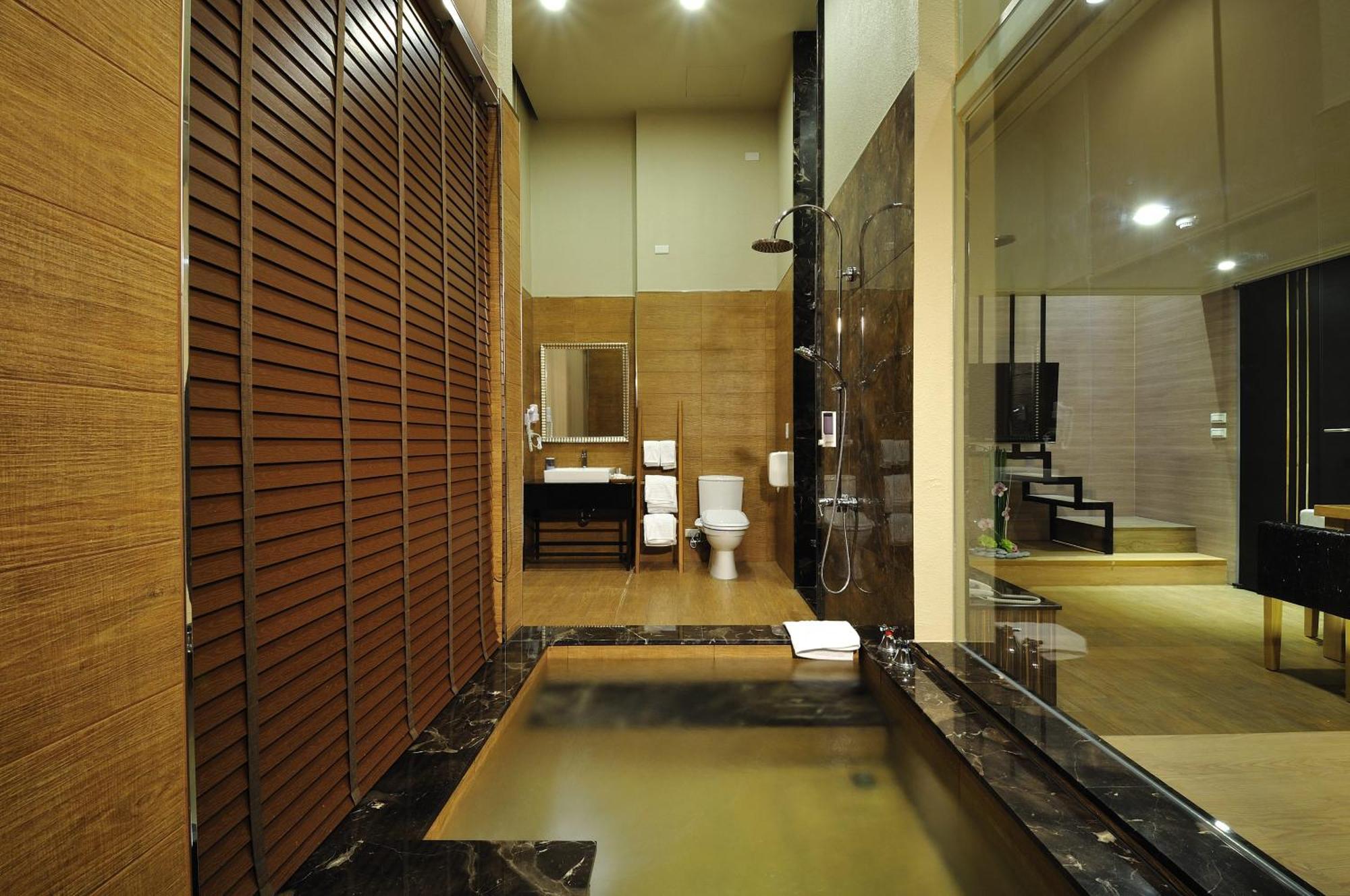 58˚ Hotspring Hotel Джиаоси Стая снимка